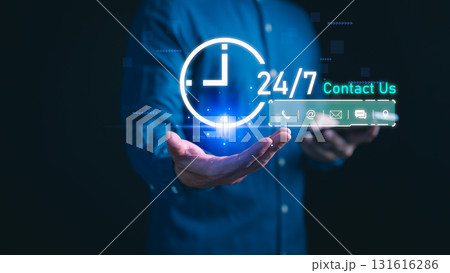 Businessman holding digital 24/7 contact support icons with phone, email, chat, customer service, online map and communication solution. Concept of business support and client assistance anytime. 131616286