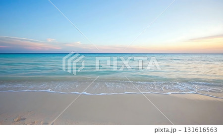 Serene Beach at Sunset with Soft Waves and Peaceful Sky in Vibrant Colors 131616563
