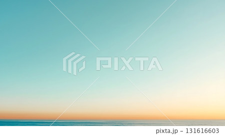 Serene Horizon over Calm Ocean with Soft Colors of Twilight at Dusk 131616603