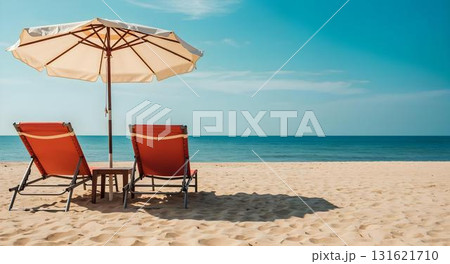 A beach chair with a vibrant umbrella on the sand, symbolizing leisure and summer fun 131621710