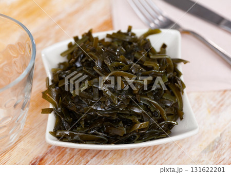 Traditional vegetable appetizer, salad of fresh seaweed. 131622201