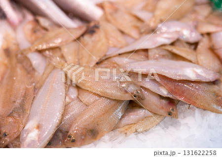 Peled fish in ice on a fish market counter close up 131622258