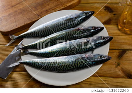 Raw mackerel fish served to table 131622260
