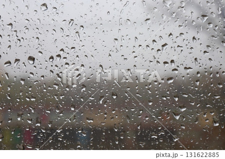 Rainy autumn street view through window Rainy autumn street view through window 131622885