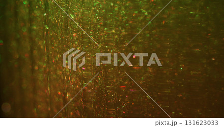 Bokeh light. Vibrant particles. Blur yellow orange color illuminated gleam shimmer round texture floating on abstract art background. Bokeh light. Vibrant particles. Blur yellow orange color illuminated gleam shimmer round texture floating on abstract art background. 131623033