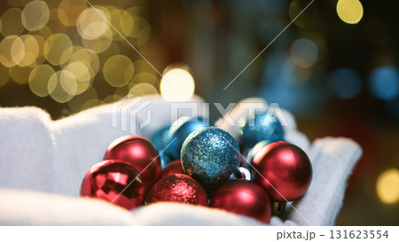 santa claus hand with colored balls santa claus hand with colored balls 131623554