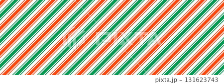Striped Christmas seamless pattern. Red and green diagonal lines wallpaper. Xmas candy cane peppermint repeating background. Winter holiday present wrapping paper design. Vector decoration backdrop 131623743