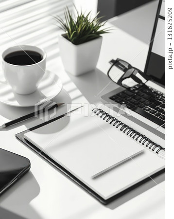 Minimalist Workspace Featuring Coffee Cup Plant and Notepad on White Desk with Laptop Glasses and Pencil 131625209