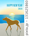 2026年午年　海辺の砂浜を歩く馬の年賀状縦型　初日の出と逆光のデザイン 131625860