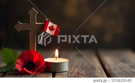 Red poppy flowers and a wooden cross on a table, symbolizing remembrance and honor for veterans on Veterans Day 131628145