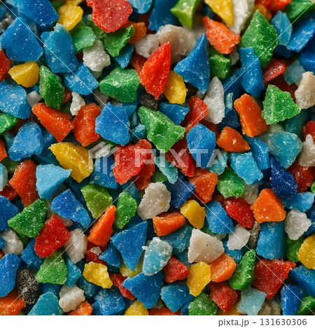 Colorful Recycled Plastic Flakes CloseUp. for illustrating environmental conservation economy Colorful Recycled Plastic Flakes CloseUp. for illustrating environmental conservation economy 131630306