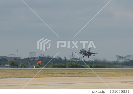 Supersonic fighter jet moving in airport on technology background Supersonic fighter jet moving in airport on technology background 131630821