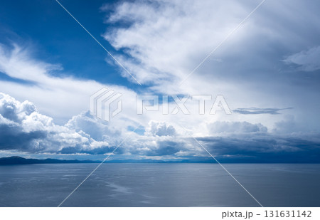 View of Lake Titicaca from Amantani Island under stormy clouds 131631142
