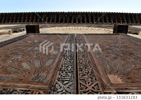 Carved wooden door details with geometric patterns, Bou Inania Madrasa. Fez, Morocco 131631283