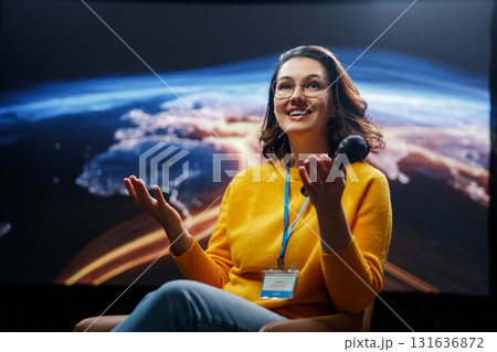 woman is giving a presentation at conference woman is giving a presentation at conference 131636872