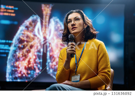 woman is giving a presentation at conference 131636892