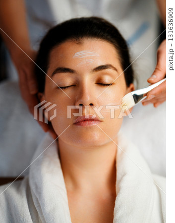 Cosmetologist at work Cosmetologist at work 131636909