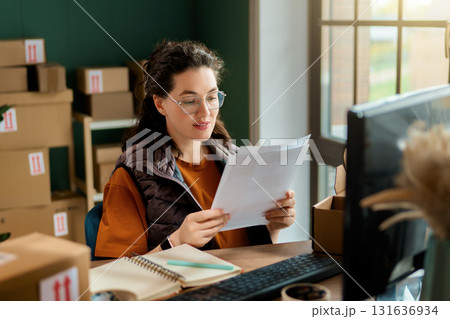 Woman working in a warehouse 131636934