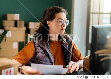 Woman working in a warehouse 131636954