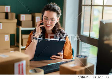 Woman working in a warehouse 131636955