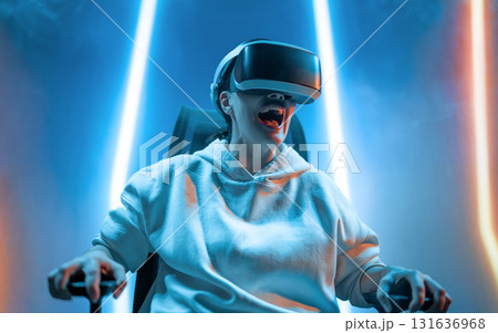 Woman with VR virtual reality goggles Woman with VR virtual reality goggles 131636968