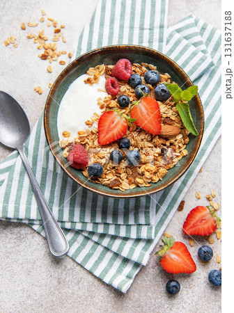 Granola bowl with fresh berries for healthy breakfast Granola bowl with fresh berries for healthy breakfast 131637188