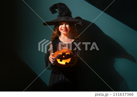Girl is celebrating Halloween Girl is celebrating Halloween 131637366