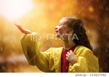girl in the rain on an autumn walk girl in the rain on an autumn walk 131637392