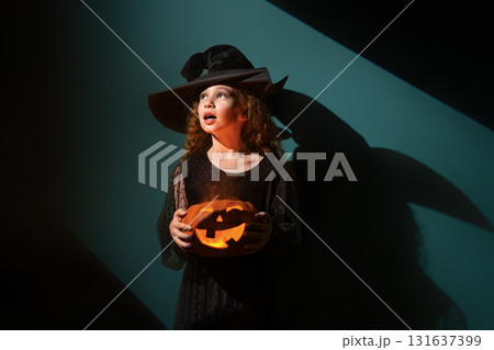 Girl is celebrating Halloween Girl is celebrating Halloween 131637399