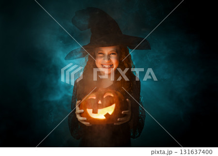 Girl is celebrating Halloween 131637400