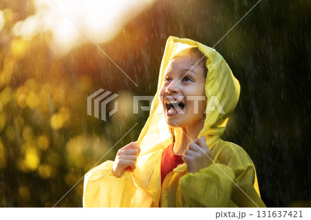 girl in the rain on an autumn walk girl in the rain on an autumn walk 131637421