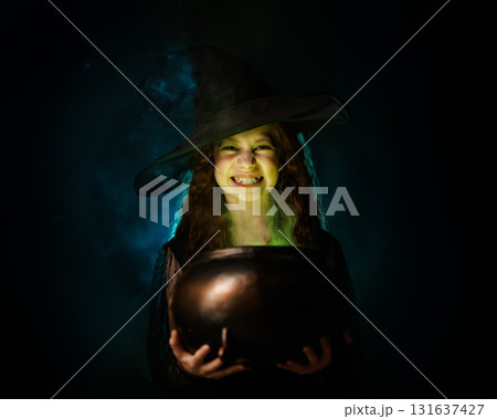 Girl is celebrating Halloween Girl is celebrating Halloween 131637427