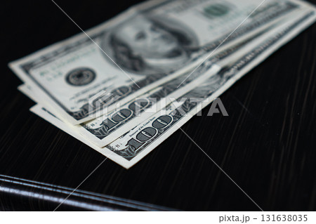 Money dollar closeup earnings savings cash wealth 131638035
