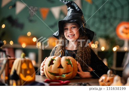Girl is celebrating Halloween Girl is celebrating Halloween 131638199
