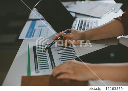 Portrait of young Hispanic professional business woman standing in office. Happy female company executive, smiling businesswoman entrepreneur corporate leader manager looking at camera using tablet Portrait of young Hispanic professional business woman standing in office. Happy female company executive, smiling businesswoman entrepreneur corporate leader manager looking at camera using tablet 131638294