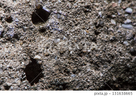 A close-up of a stone shows its relief 131638665