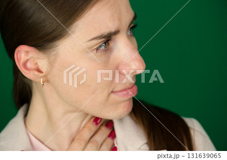 Set of photos of young European woman in light blazer and blue jeans showing various emotions gestures and expressions on green chroma key background with copy space for advertising and social media 131639065