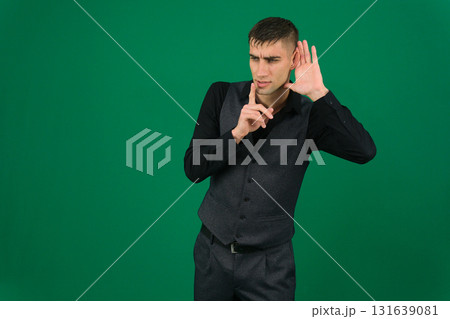 Set of videos with handsome European businessman in classic suit vest and black shirt showing different emotions gestures and confident poses on green chroma key background with copy space Set of videos with handsome European businessman in classic suit vest and black shirt showing different emotions gestures and confident poses on green chroma key background with copy space 131639081