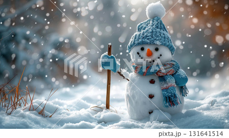 Cute snowman with blue hat and scarf standing in snowy winter Christmas landscape 131641514