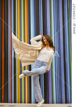 Dynamic motion near colorful urban wall Dynamic motion near colorful urban wall 131641527
