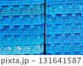 Stacks of modern blue plastic crates or containers 131641587