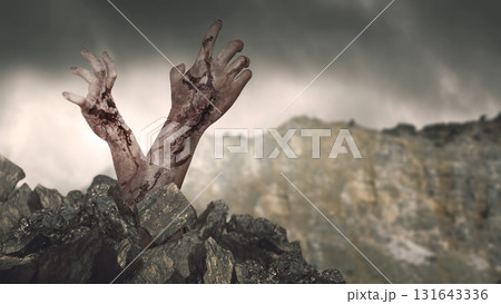 Zombie hands with wounds and blood breaking through rocky grave ground. Zombie, devil, evil, satan, or monster hand. Concept of Spooky Halloween Zombie hands with wounds and blood breaking through rocky grave ground. Zombie, devil, evil, satan, or monster hand. Concept of Spooky Halloween 131643336
