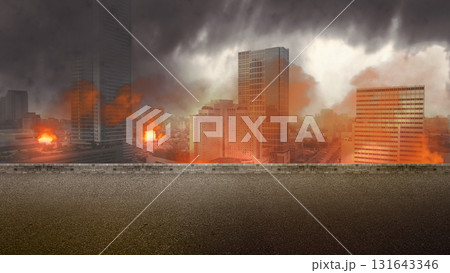 Cityscape on fire and in ruins. Damaged buildings, smoke, and fire against a dark sky. The dramatic apocalyptic scene is scary and frightening. Mockup. Copy Space. Wallpaper or Halloween background 131643346