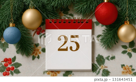 Christmas calendar with December 25 surrounded by ornaments and fir branches 131643451