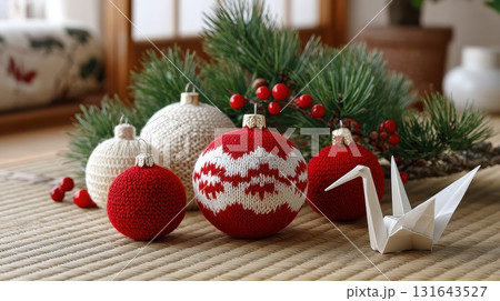 Knitted Christmas ornaments and origami crane on tatami 131643527