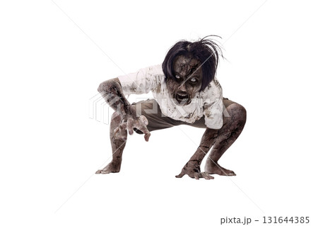 Portrait of an Indonesian southeast asian scary male zombie with a wound and blood on the body isolated over a white background. Spooky expression. Concept of Halloween or Horror 131644385