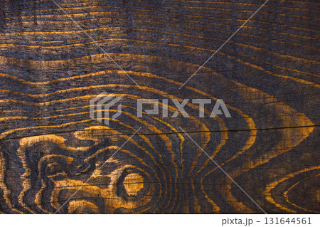 Exploring Abstract Patterns on a Dark Stained Wooden Surface with Incredible Details 131644561