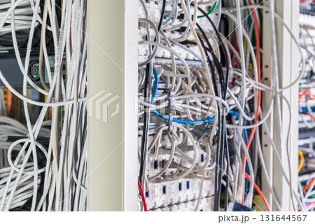 server room rack with tangled network cables creating messy unti server room rack with tangled network cables creating messy unti 131644567