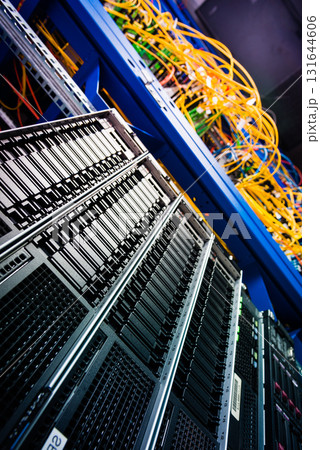 cluster of data storage SSD hard drives inside server rack 131644606