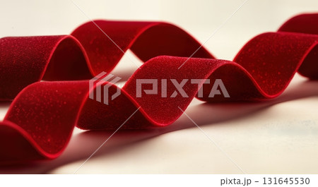 Luxurious Red Velvet Ribbon Flowing Elegantly for a Festive Christmas Celebration Background Luxurious Red Velvet Ribbon Flowing Elegantly for a Festive Christmas Celebration Background 131645530